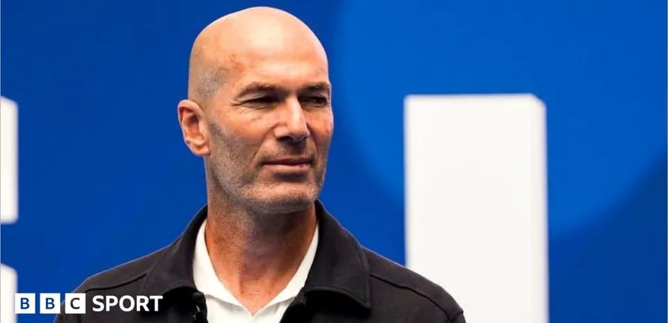 Zinedine Zidane speaking at an event backdrop