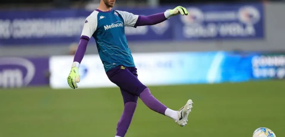 Goalkeeper preparing to kick ball during training