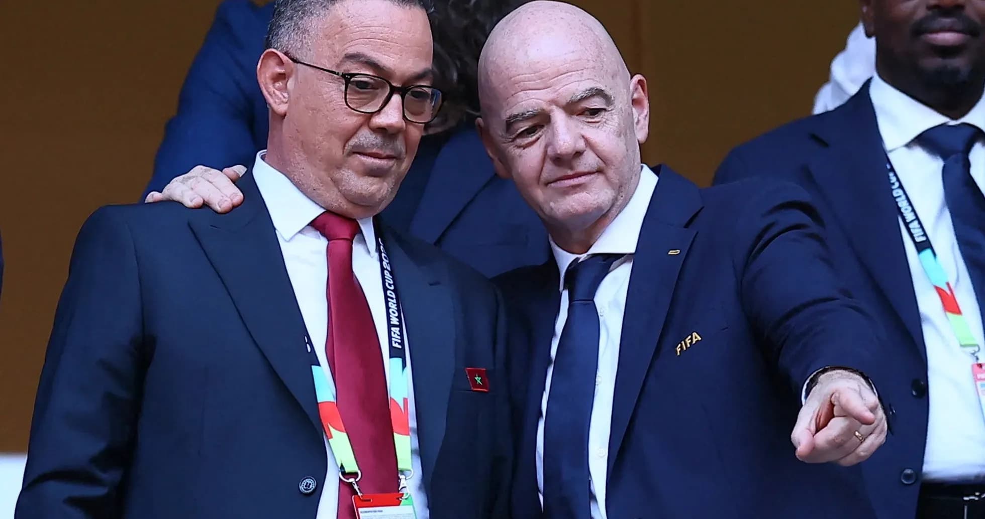 Two officials discussing during a football event