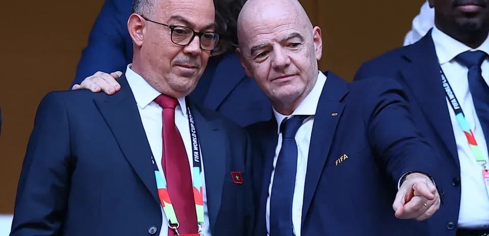 Two officials discussing during a football event