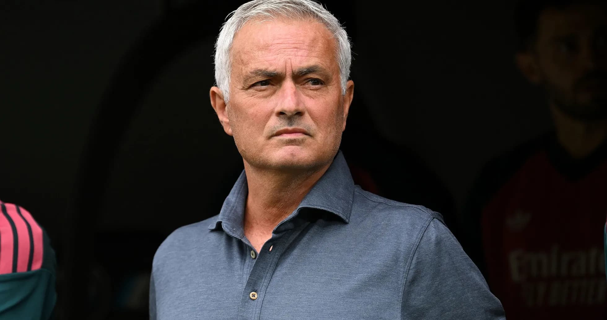 Football manager observing from the sidelines