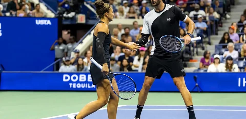 Tennis players celebrating a point during match