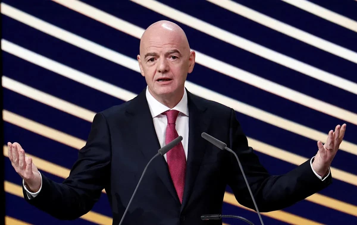 FIFA president speaking at podium during event