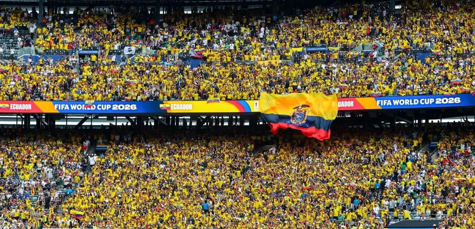 Ecuadorian fans cheering in stadium during World Cup