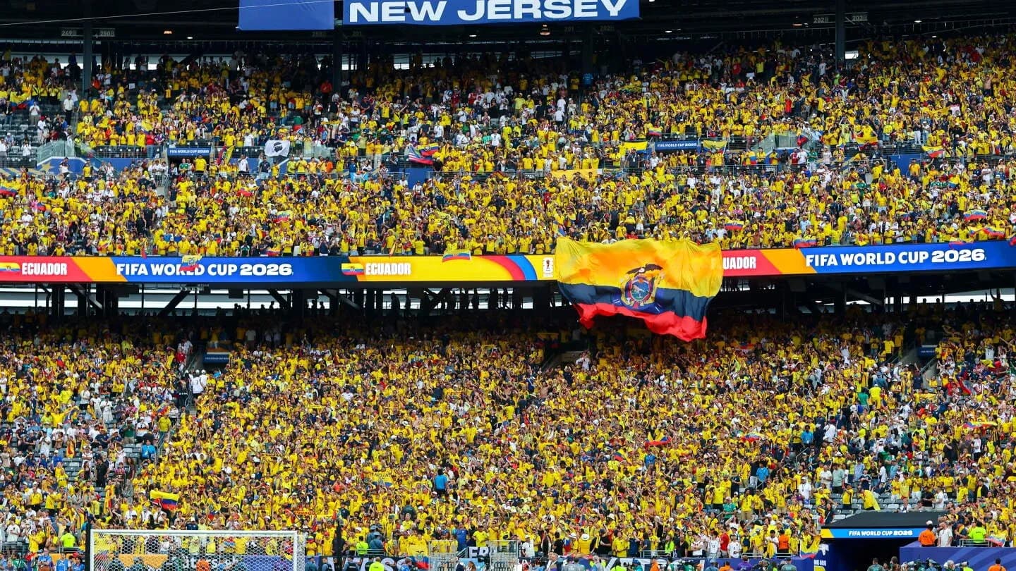 Ecuadorian fans cheering in stadium during World Cup