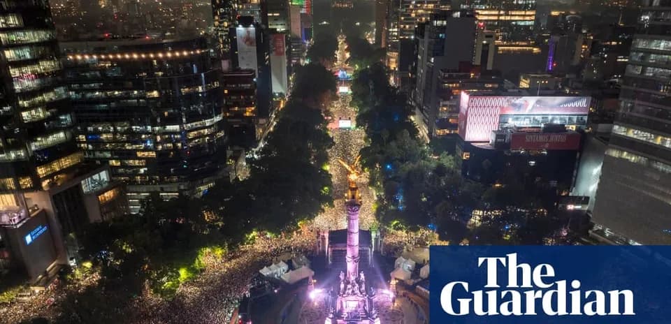 Crowd gathering at night in urban area