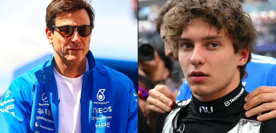 Toto Wolff and young driver in racing gear