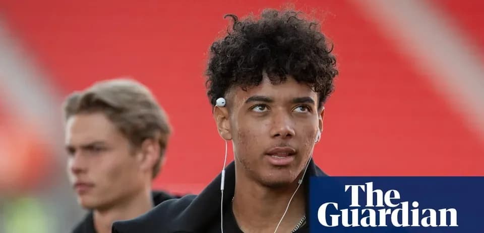 Young player wearing earphones before a match