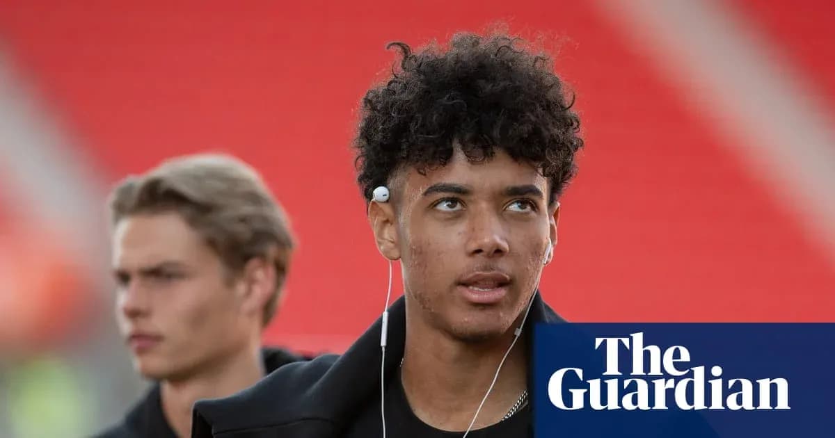 Young player wearing earphones before a match