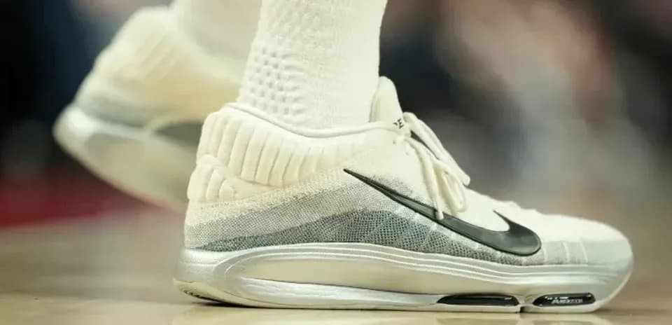 Close-up of basketball shoes on court
