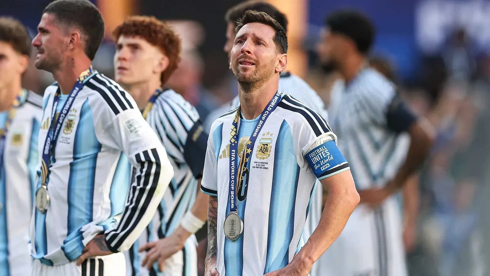Argentina players wearing silver medals after match