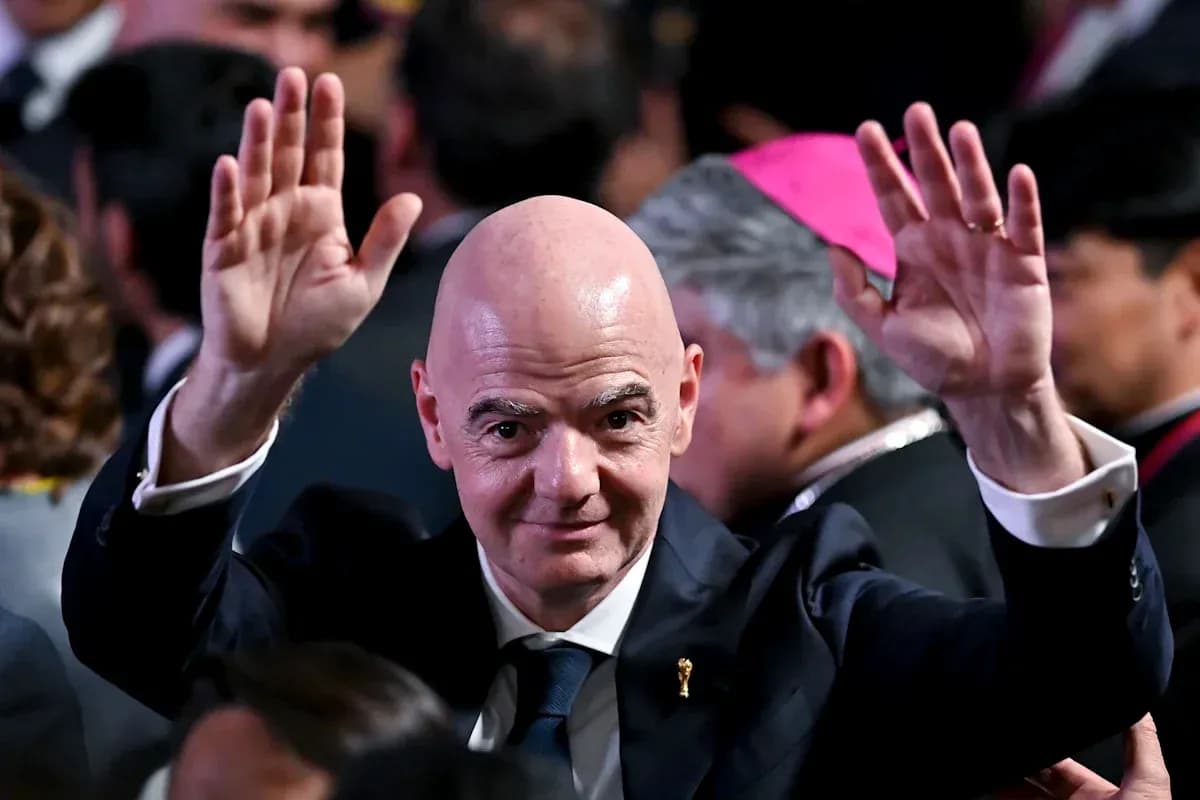 Person waving in a crowded event setting