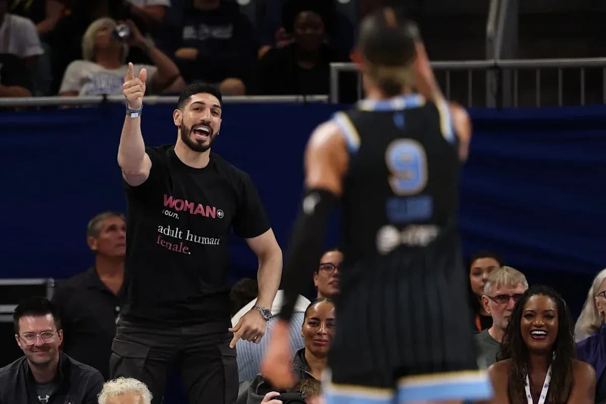 Fan cheering enthusiastically during basketball game