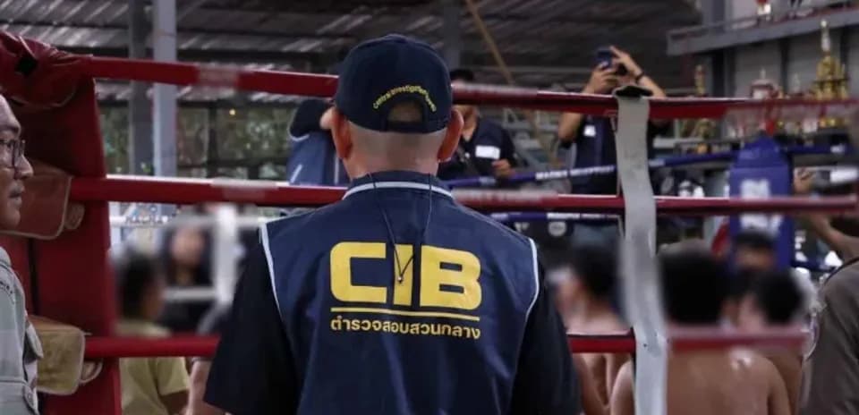 CIB officer observing boxing match in gym