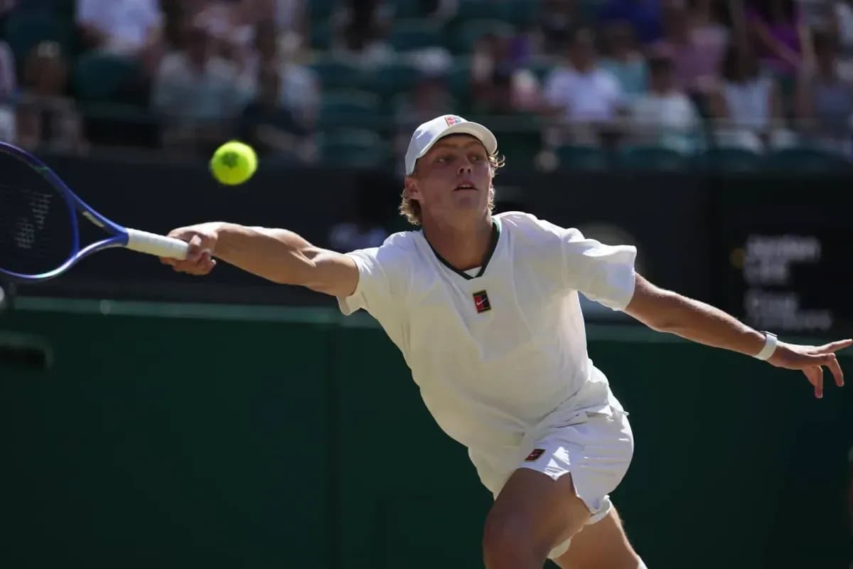Tennis player hitting a ball during match