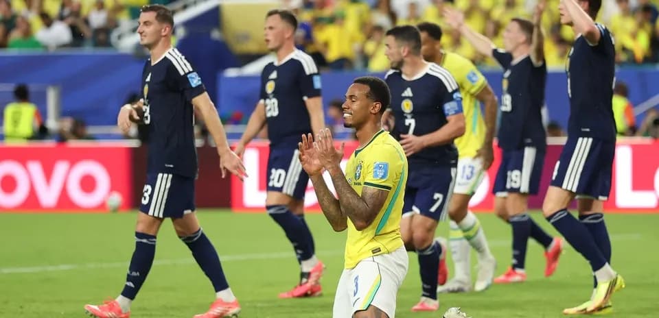 Brazilian player kneeling on field during match