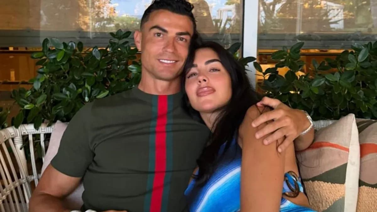 Couple posing together in a cozy setting