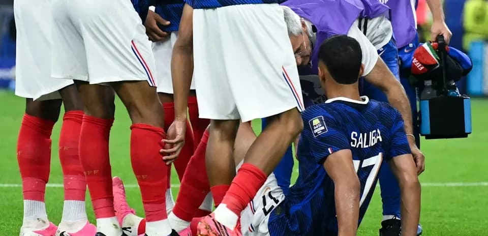Player receiving medical attention on the field