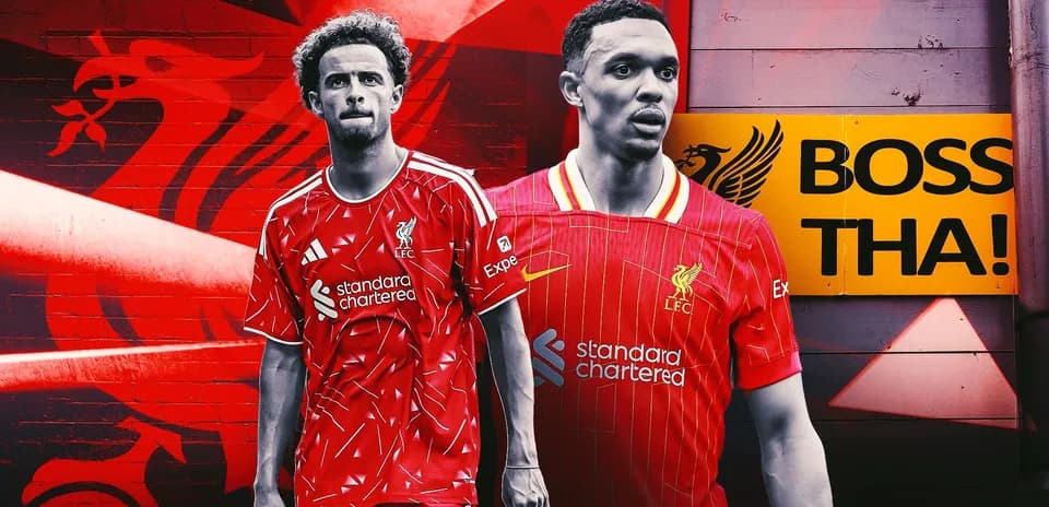Liverpool players in home kit with club logo