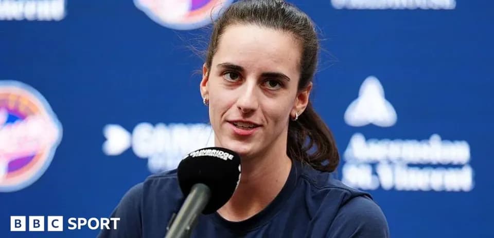 Tennis player at press conference with microphone