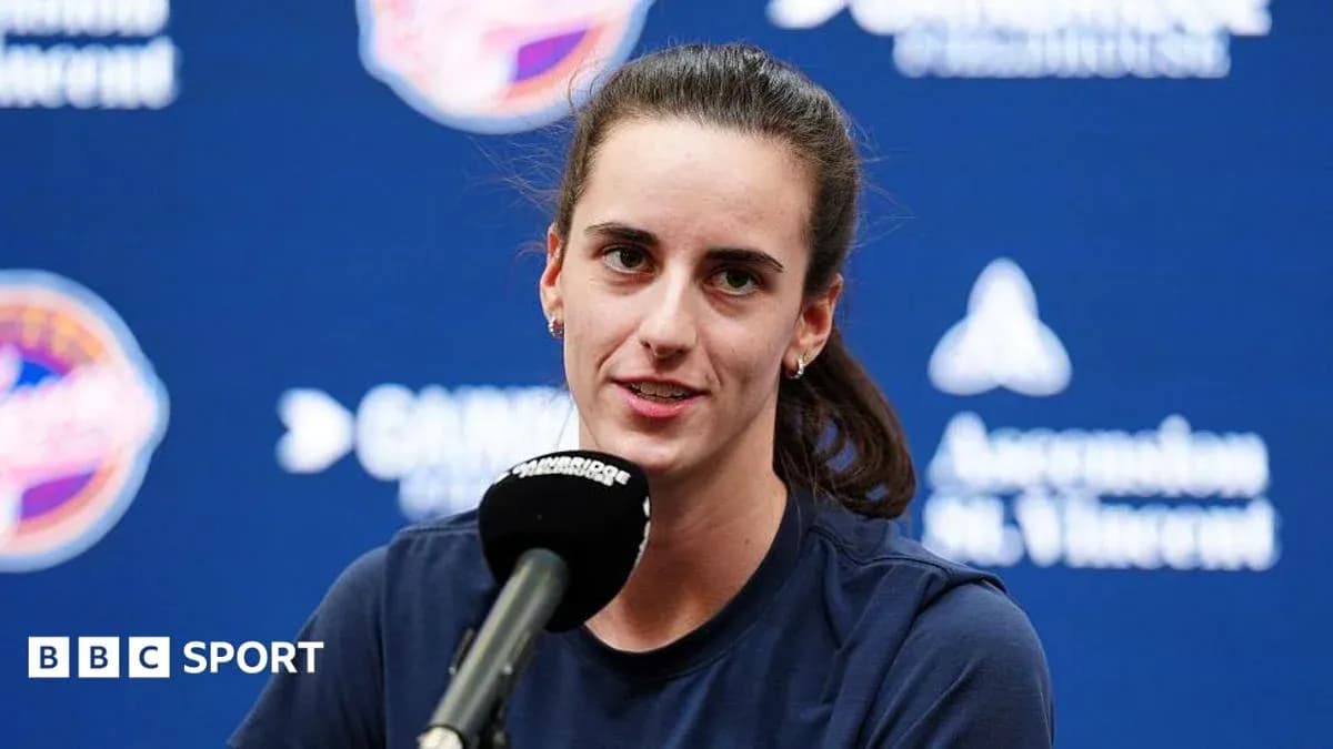 Tennis player at press conference with microphone