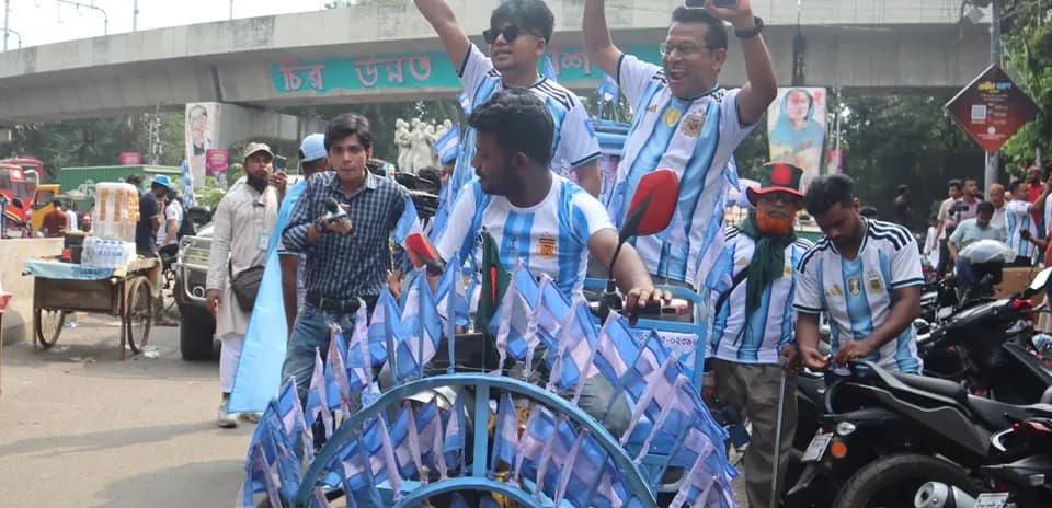 Fans celebrating with flags before a match