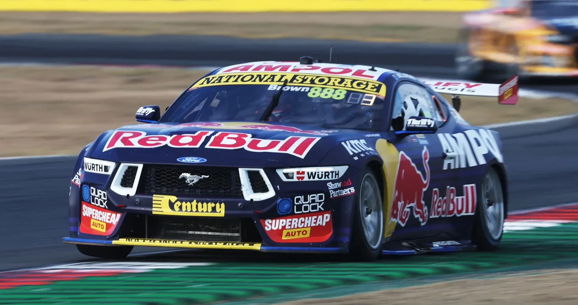 Ford Mustang racing car on track during event
