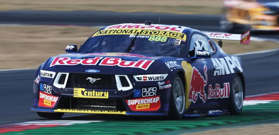 Ford Mustang racing car on track during event