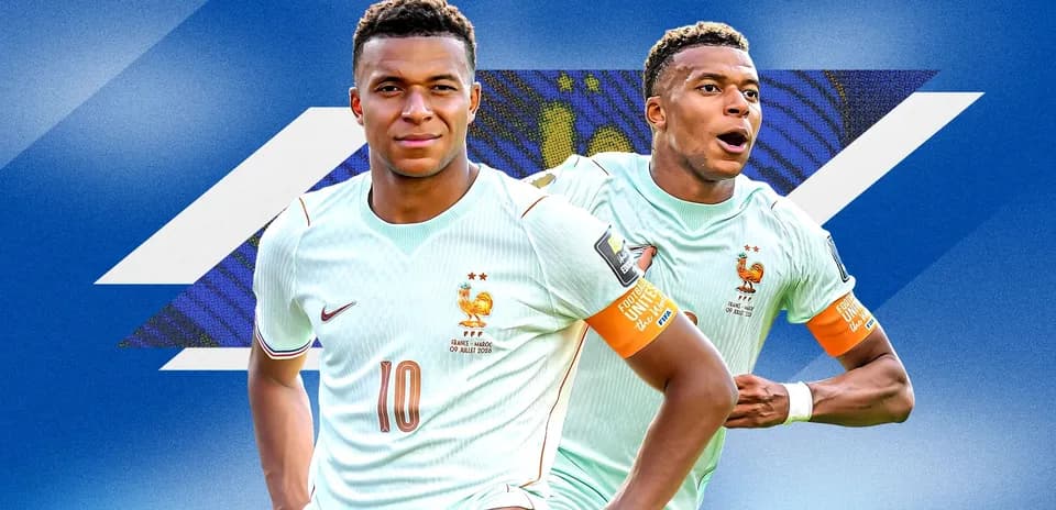 Kylian Mbappé posing in France national team kit