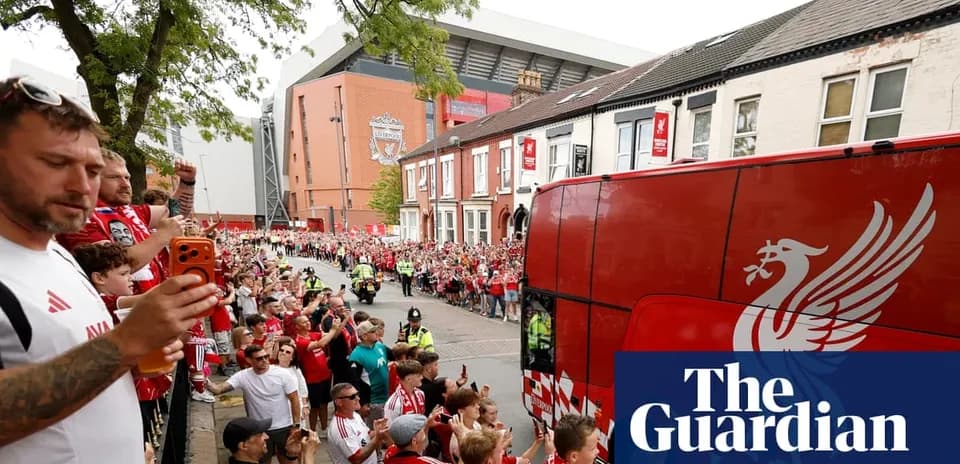 Liverpool fans greeting team bus outside Anfield