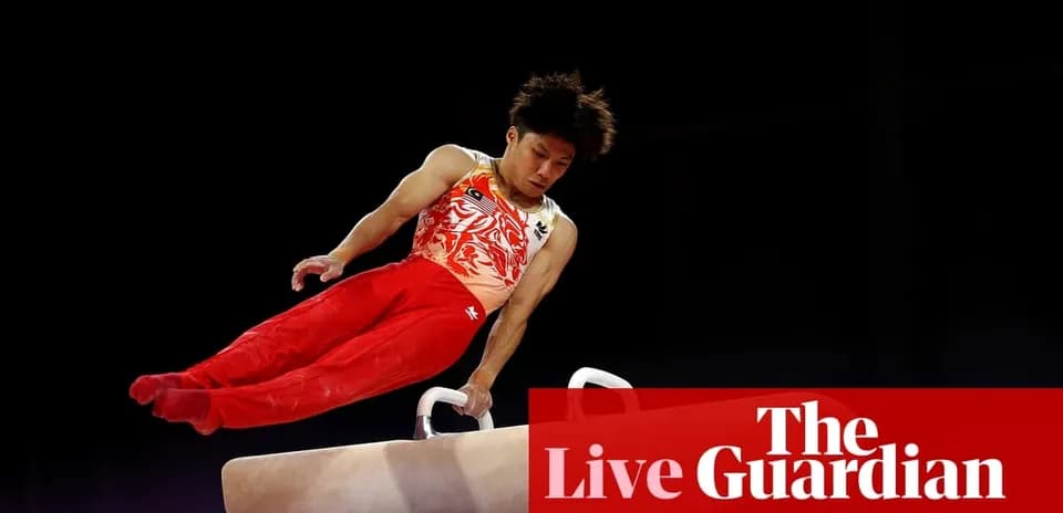 Gymnast performing on pommel horse during competition