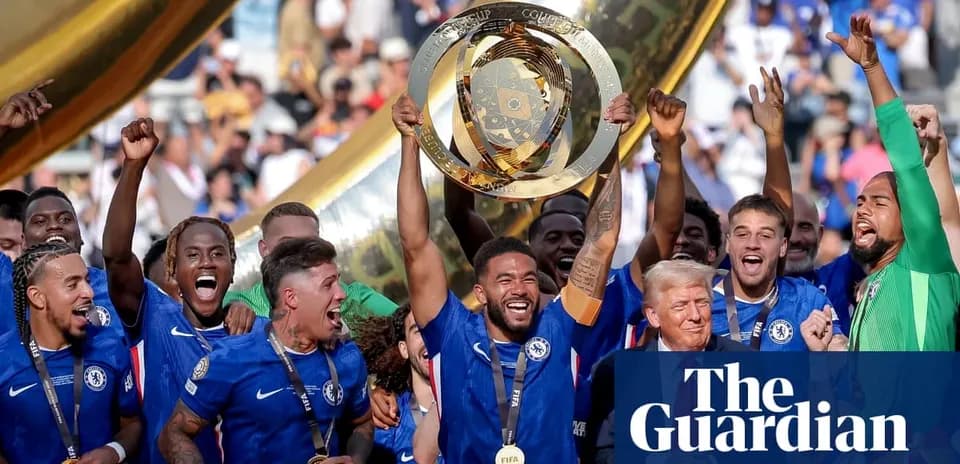 Chelsea players celebrating with trophy after victory