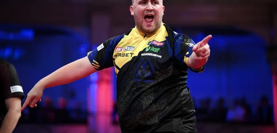Darts player celebrating during a match