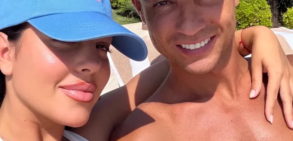 Two people posing for a selfie outdoors