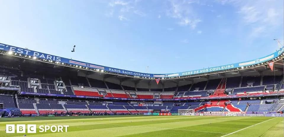 Paris Saint-Germain stadium with empty seats and pitch
