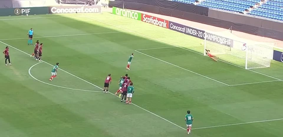 Player taking a penalty kick during match