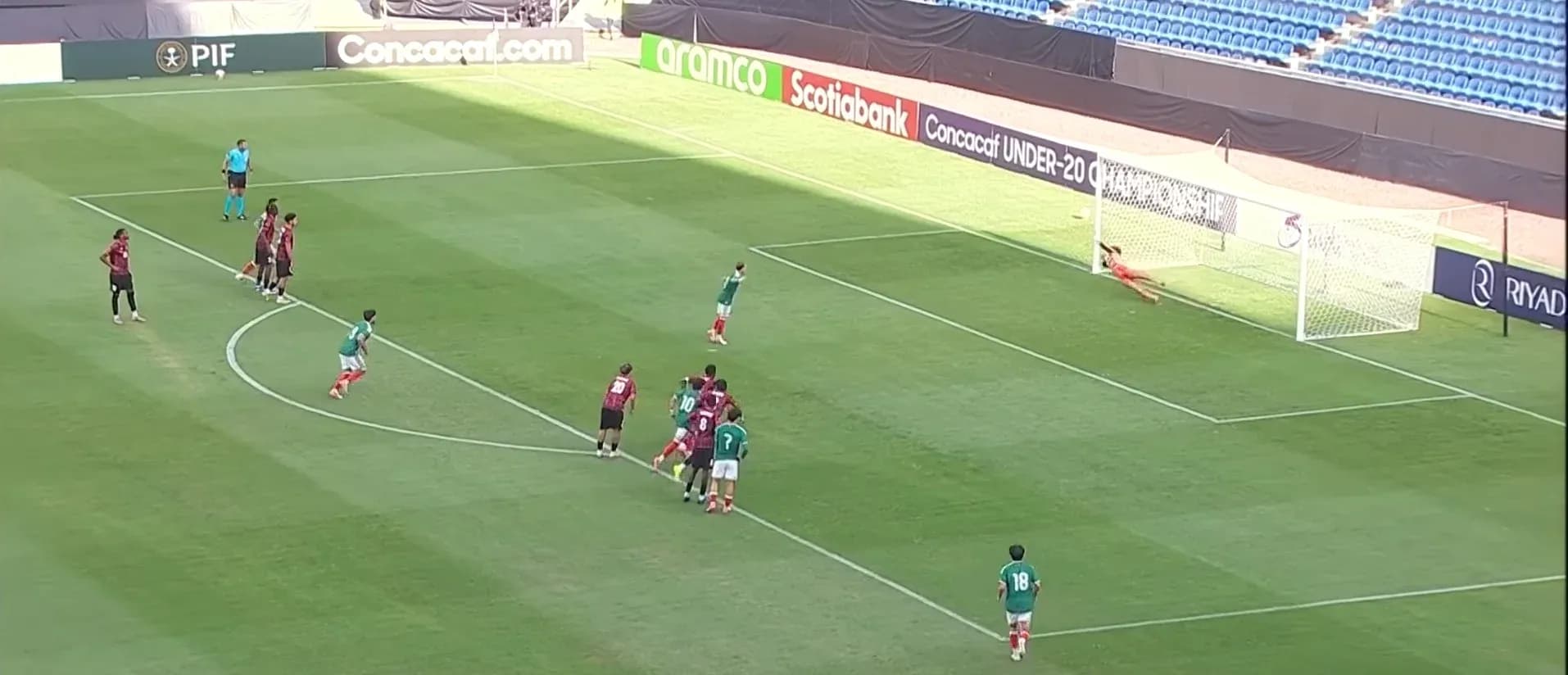 Player taking a penalty kick during match
