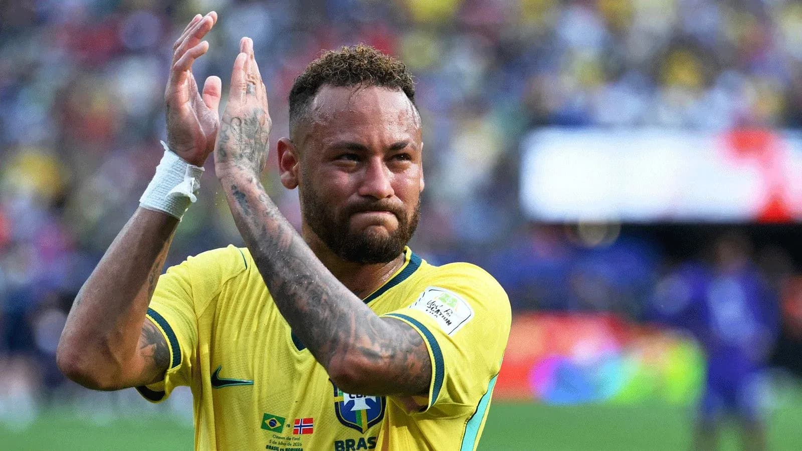 Neymar applauding fans in Brazil jersey