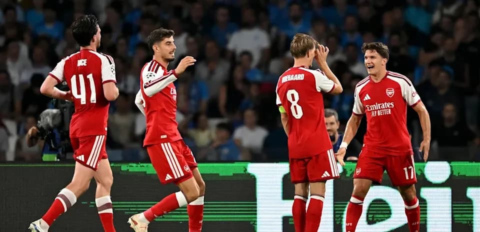 Arsenal players celebrating a goal during match