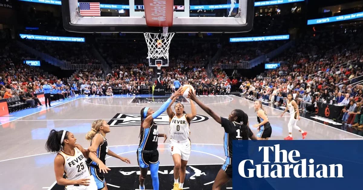 Basketball players contesting for the ball near hoop