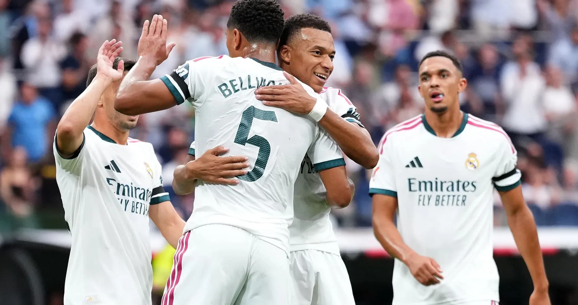 Real Madrid players celebrating a goal together
