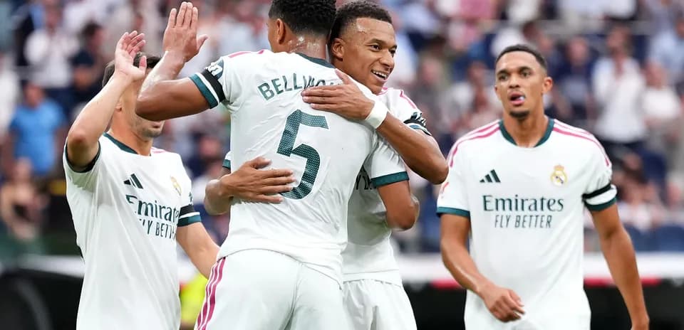 Real Madrid players celebrating a goal together
