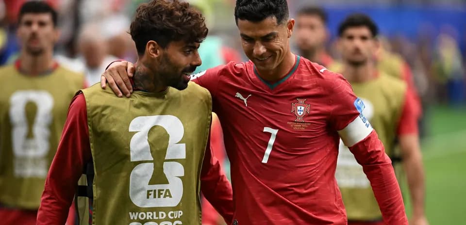 Cristiano Ronaldo and teammate walking off the pitch