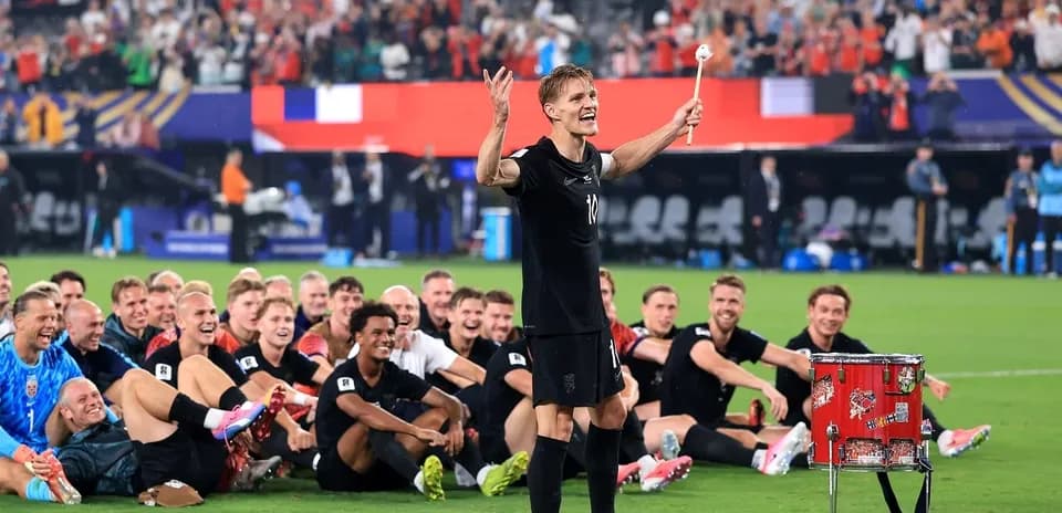 Player celebrating with teammates after match victory