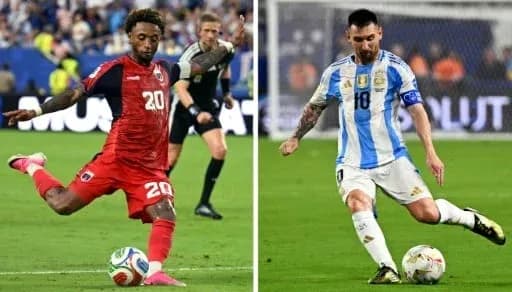 Two players dribbling the ball during match