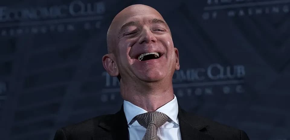 Speaker laughing at Economic Club event in Washington