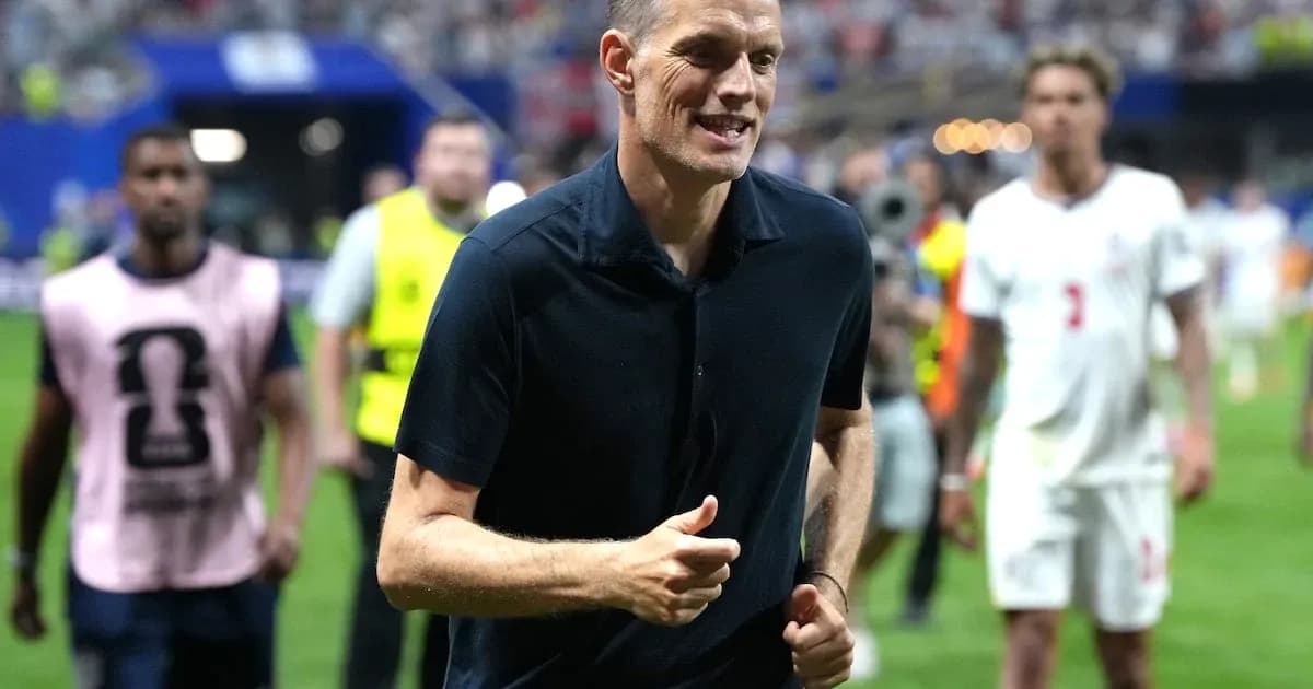 Coach running on the pitch after the match