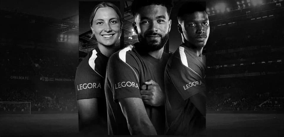 Chelsea FC players posing in team jerseys