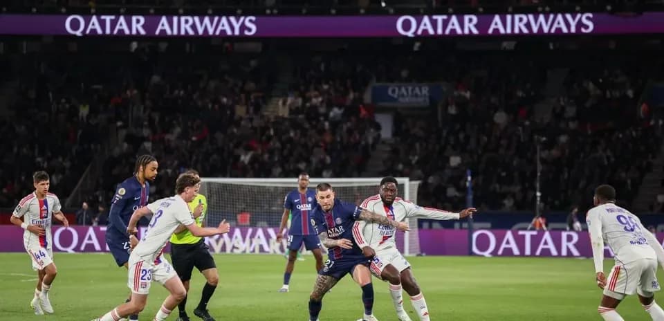 PSG players competing for the ball during match