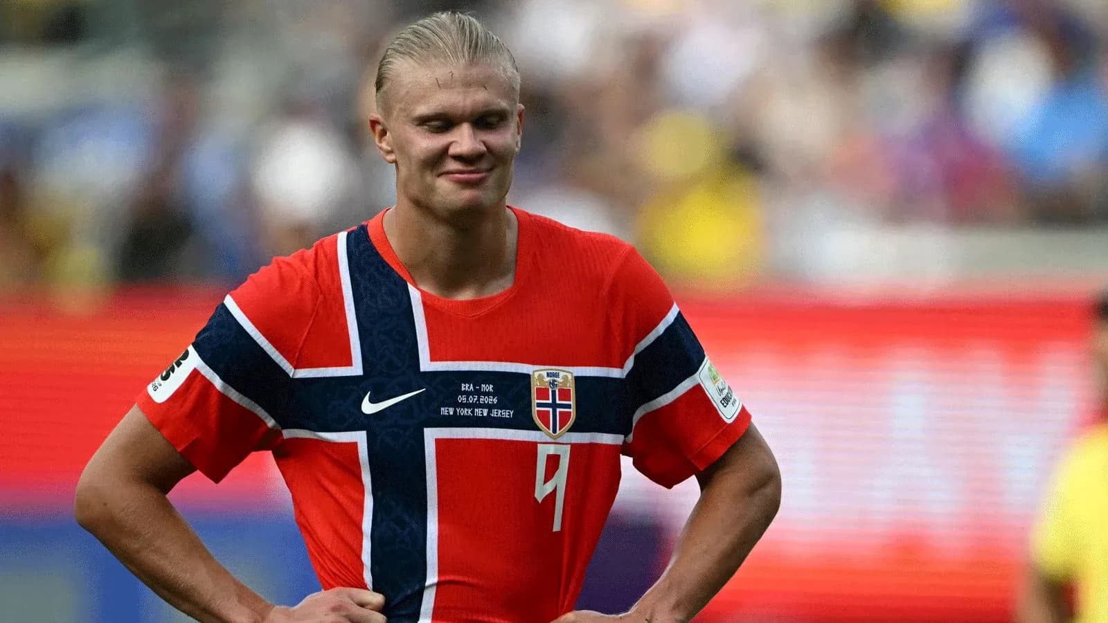 Norwegian player in red jersey during match